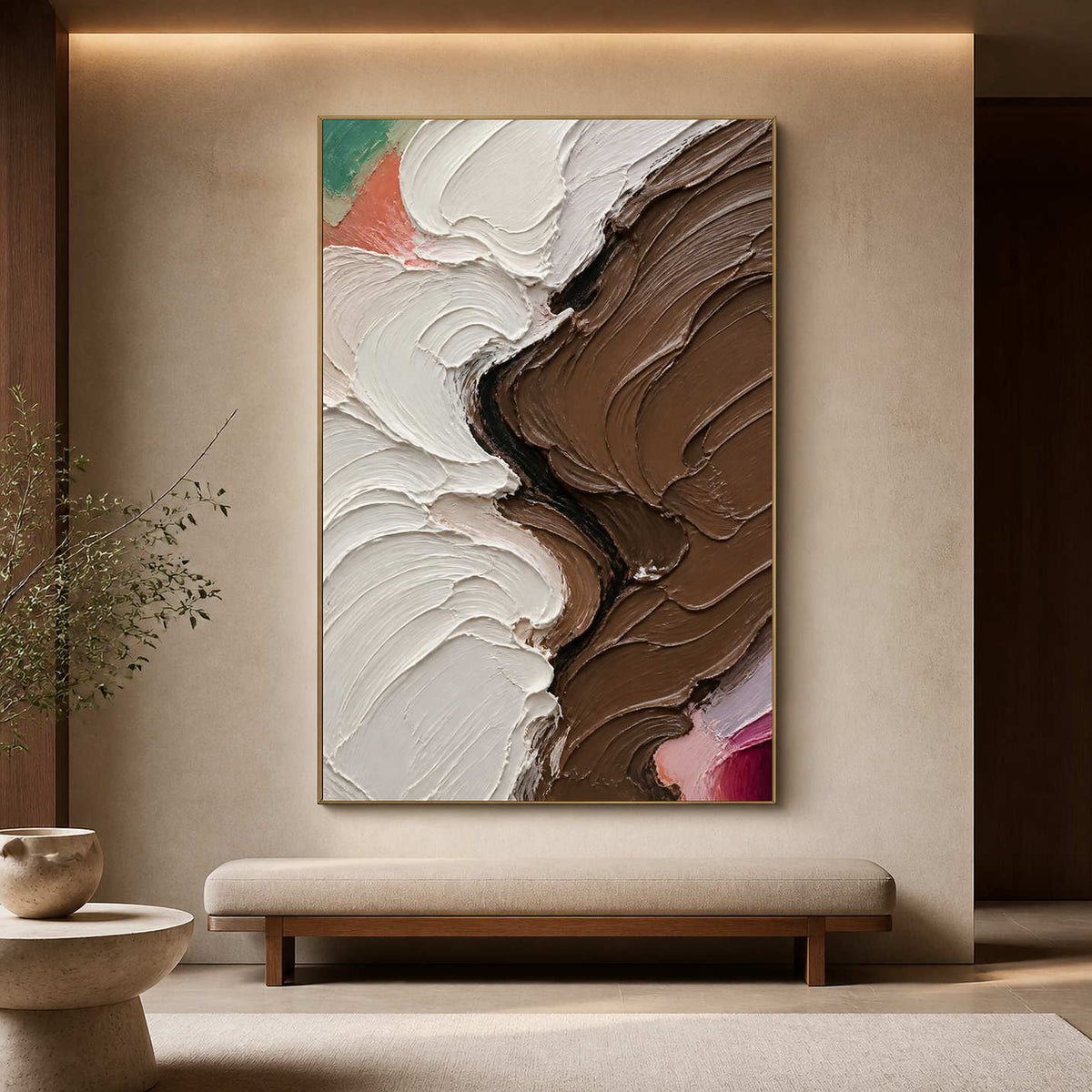 Sculptural neutral abstract wall art displayed above a gallery bench.