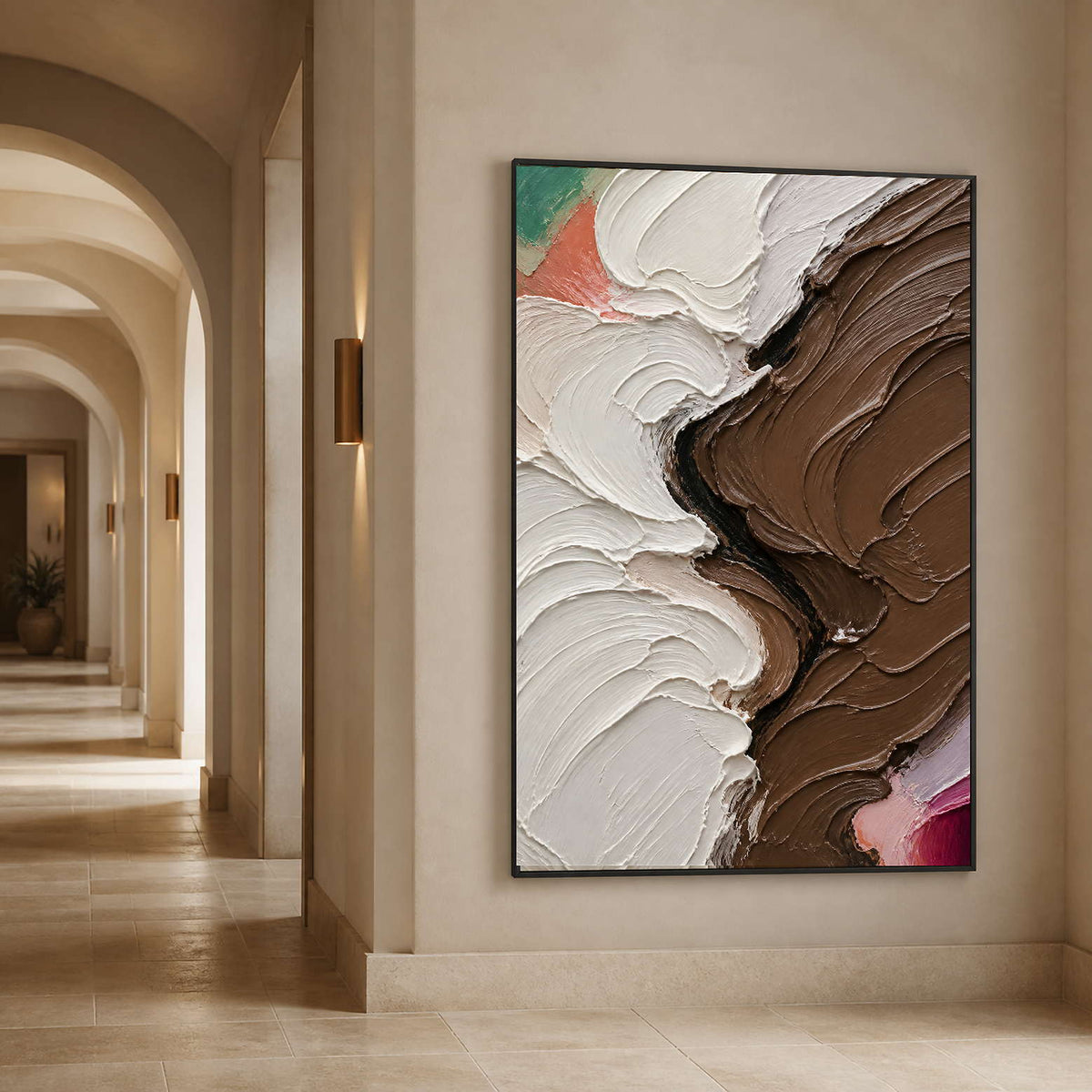 Vertical ivory and umber abstract art in a softly lit arched hallway.