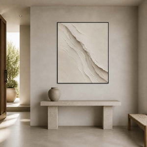 Vertical ivory abstract wall art displayed in a light gray modern entryway.