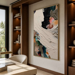 Expressive vertical artwork viewed beside warm walnut shelves in a study.