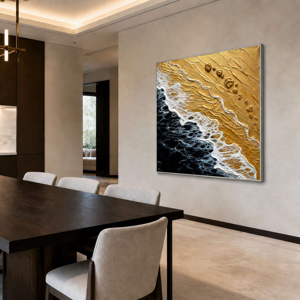 Textured gold shoreline artwork displayed in a mineral-gray dining room.