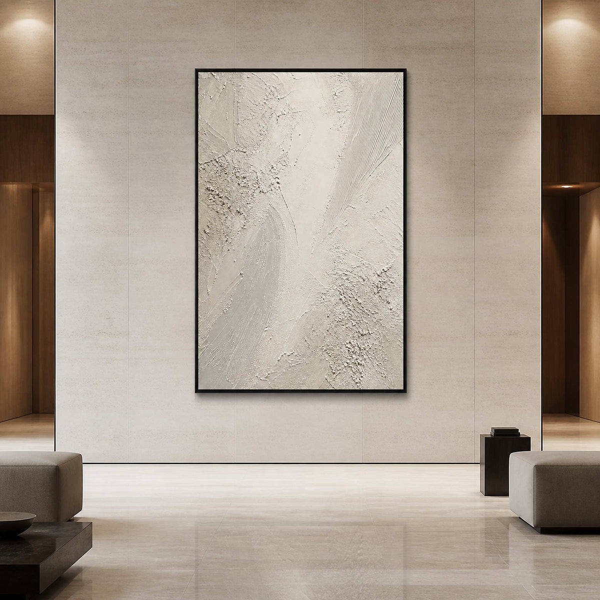 Textured white Wabi Sabi wall art displayed in an upscale hotel lobby.