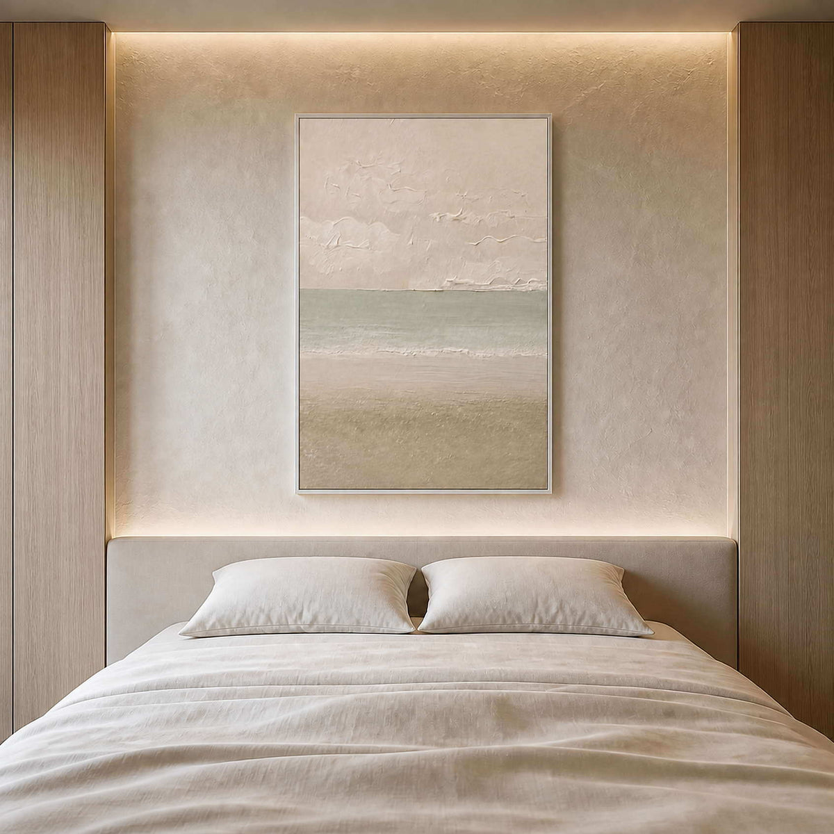 Ivory and sea-glass coastal artwork styled in a calm bedroom.