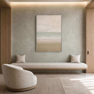 Muted green coastal wall art in a serene modern reading room.