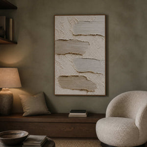 Layered neutral abstract art displayed in an intimate walnut reading room.