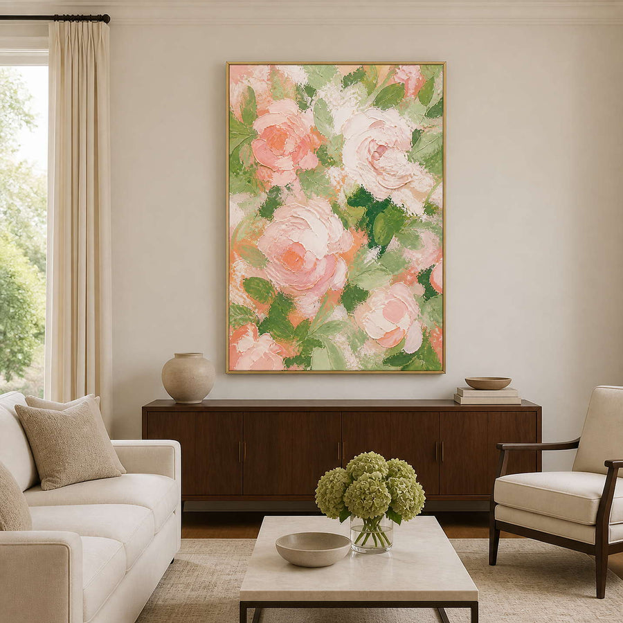 Blush pink, ivory, and green textured floral wall art in a bright neutral living room.