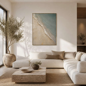 Sage coastal wall art displayed in a warm white modern living room.