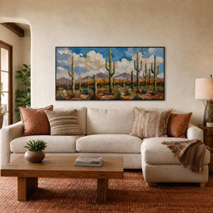 Desert wall art displayed in a warm terracotta living room.