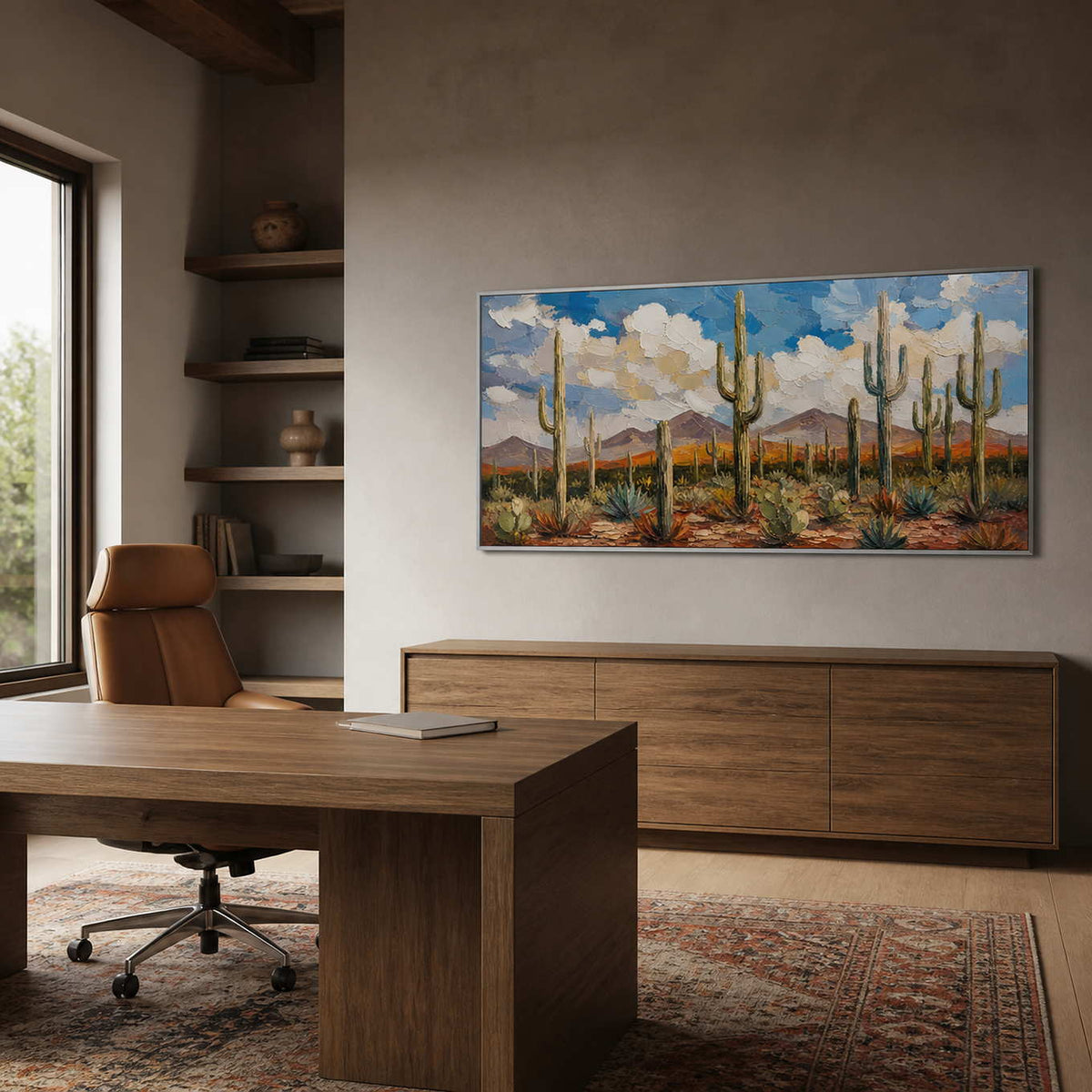 Saguaro wall art displayed in a warm stone home office.