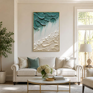 Sea-glass green and ivory coastal wall art in a bright living room.