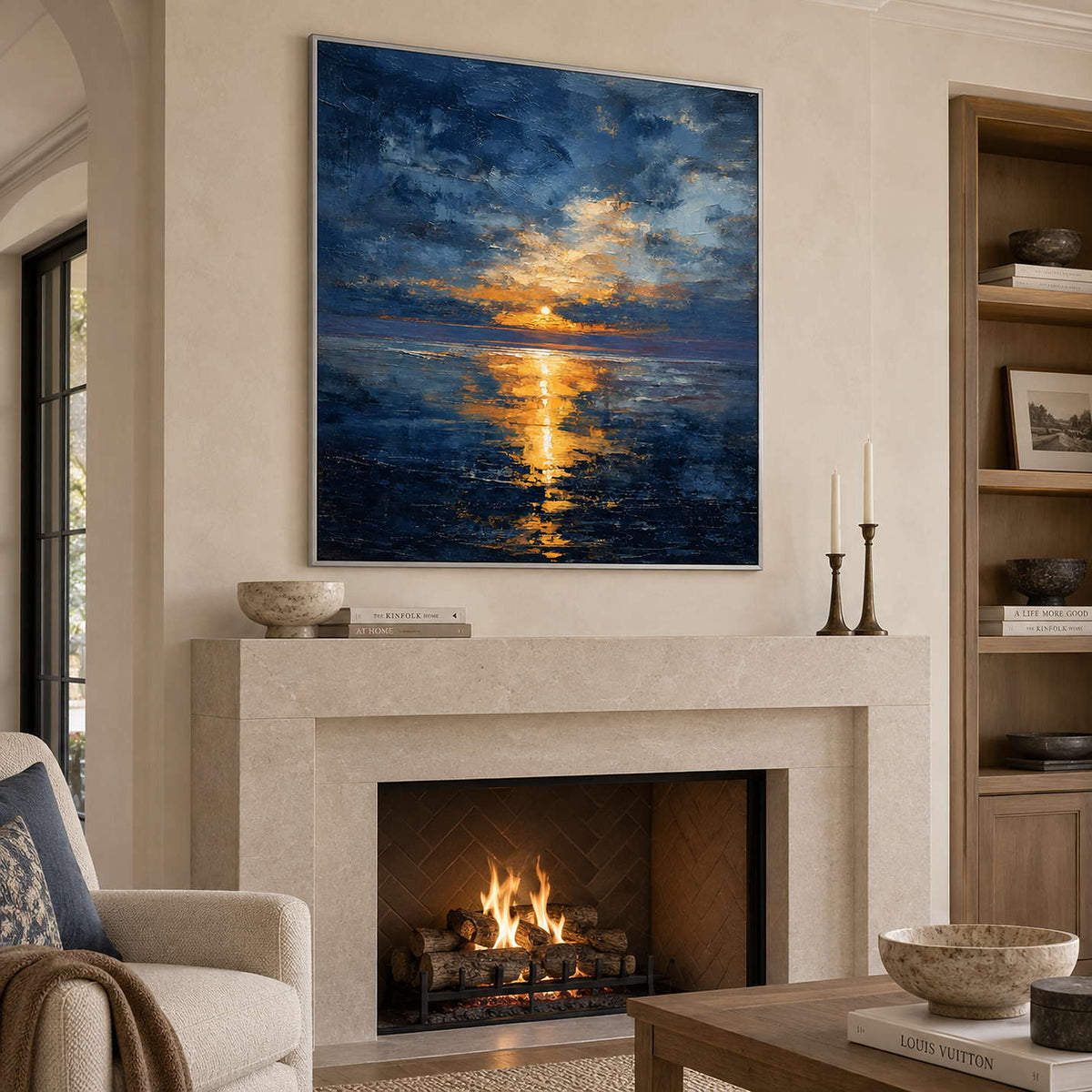 Angled view of the blue and golden seascape above a pale stone fireplace.