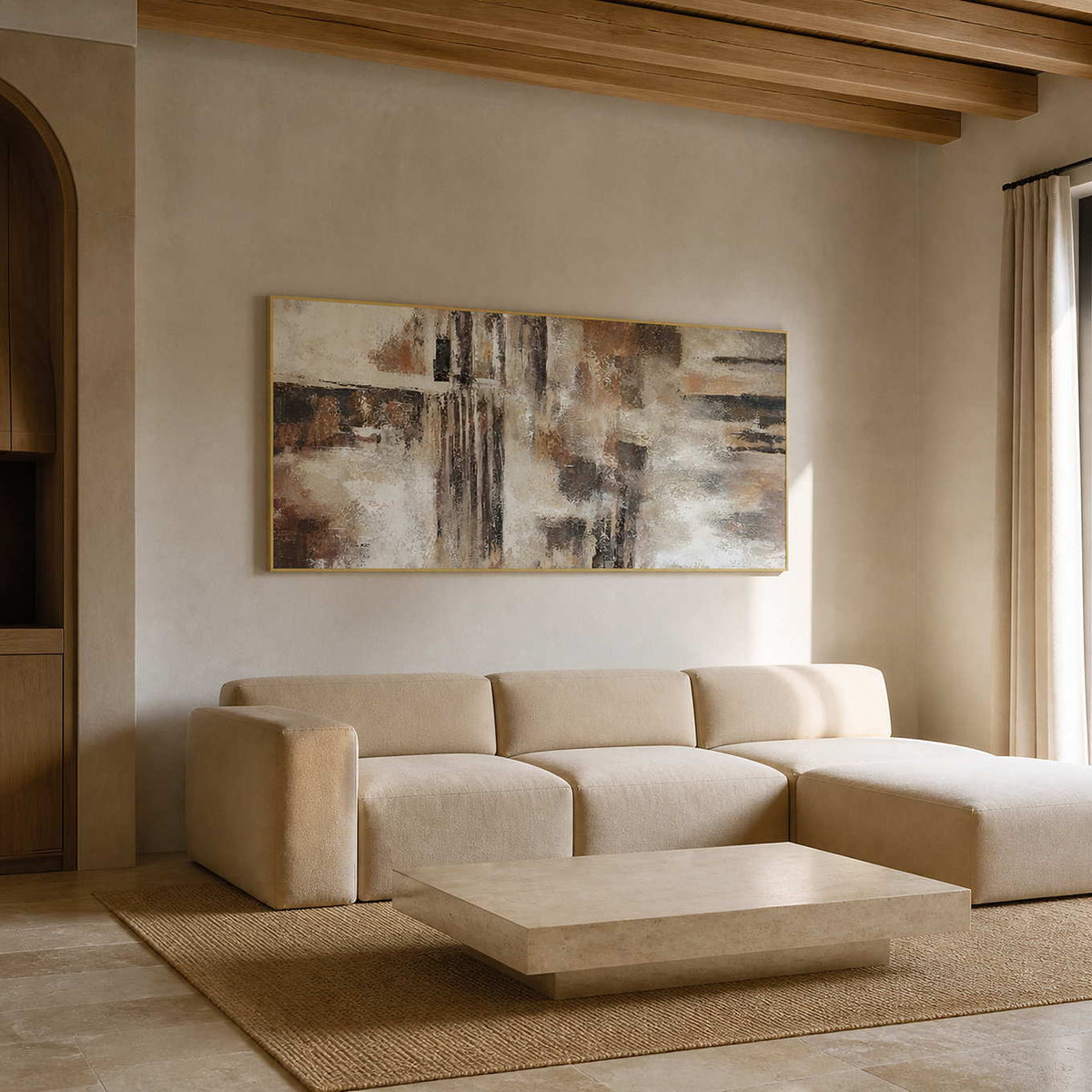 Textured abstract wall art displayed in a warm hotel suite lounge.