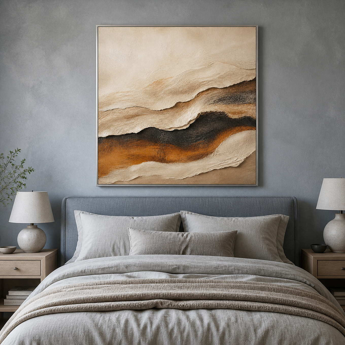Textured abstract wall art displayed in a serene blue-gray bedroom.