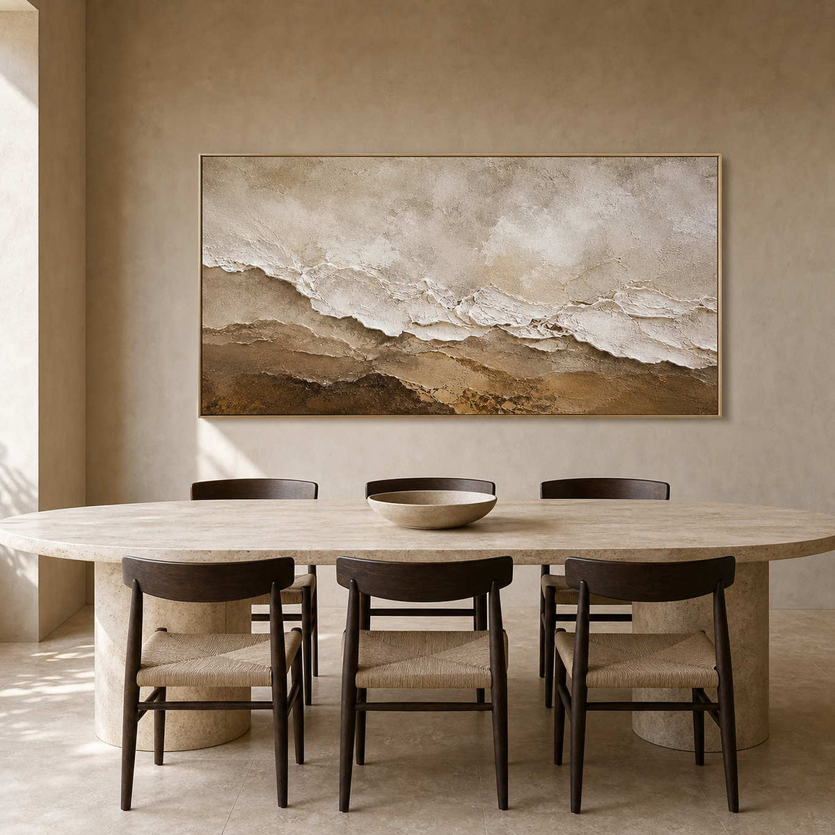 Earth-tone textured painting above a sculptural travertine dining table.