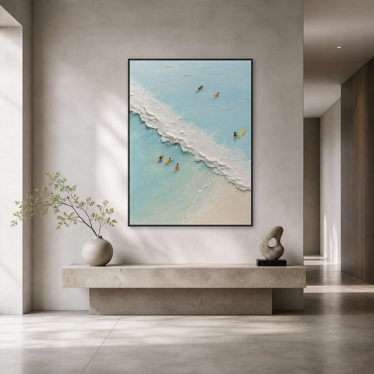 Turquoise coastal wall art displayed in a light gray modern entryway.