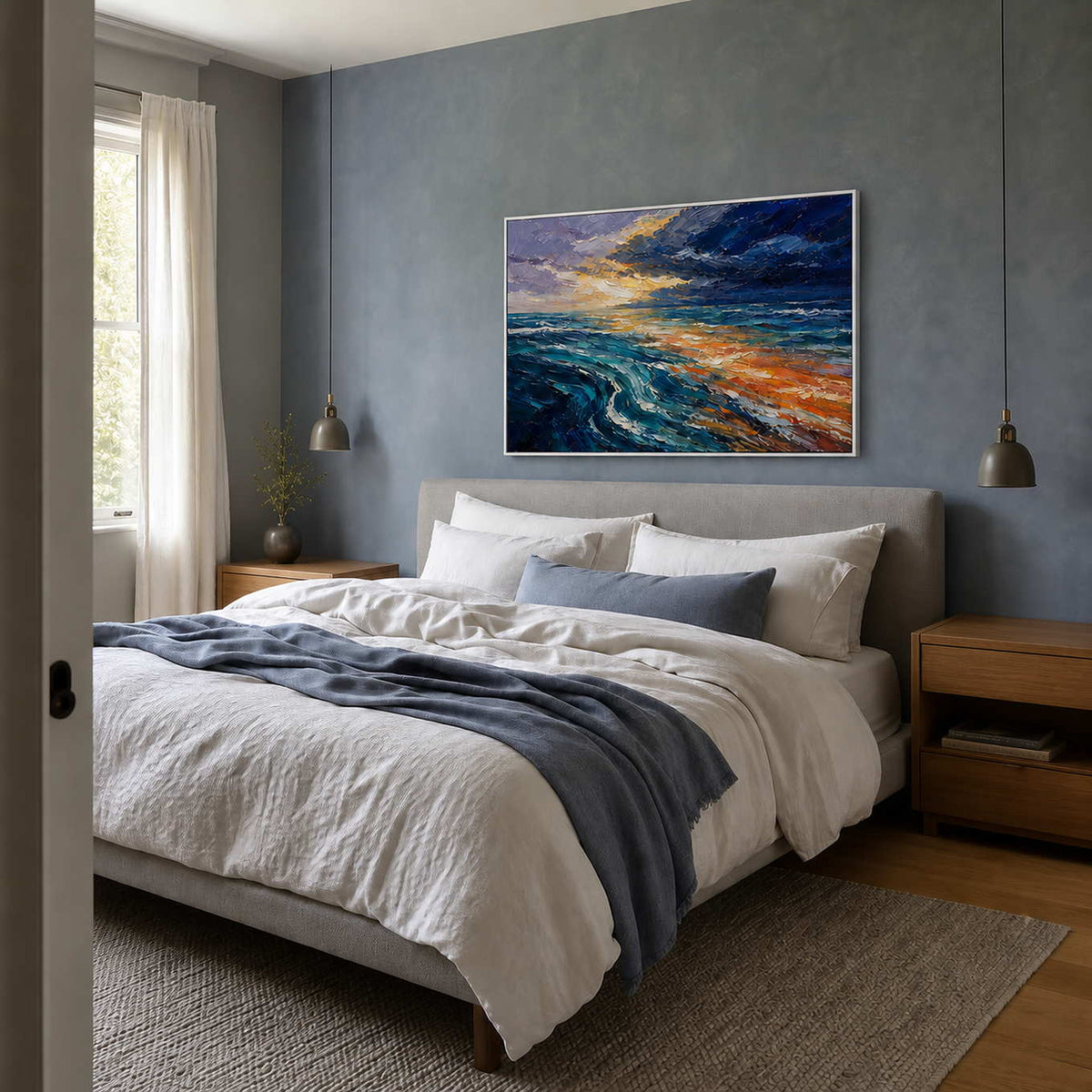 Turquoise and gold seascape wall art styled above a blue-gray bedroom.