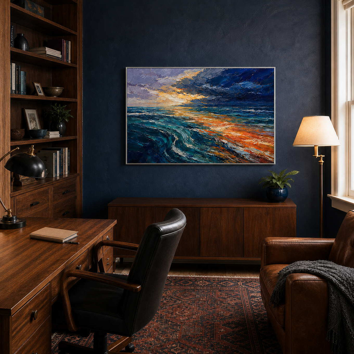 Textured ocean artwork displayed in a navy home office.