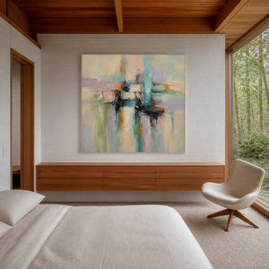 Softly colored abstract wall art in a bright modern bedroom.