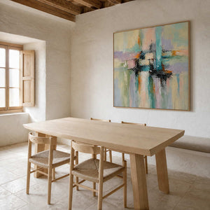 Pastel abstract wall art displayed in a warm minimalist dining room.