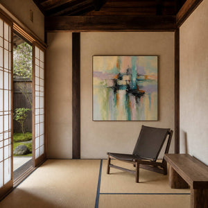 Pastel and black abstract wall art in a serene tatami guest room.