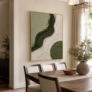 Olive and ivory abstract canvas in a refined dining room.