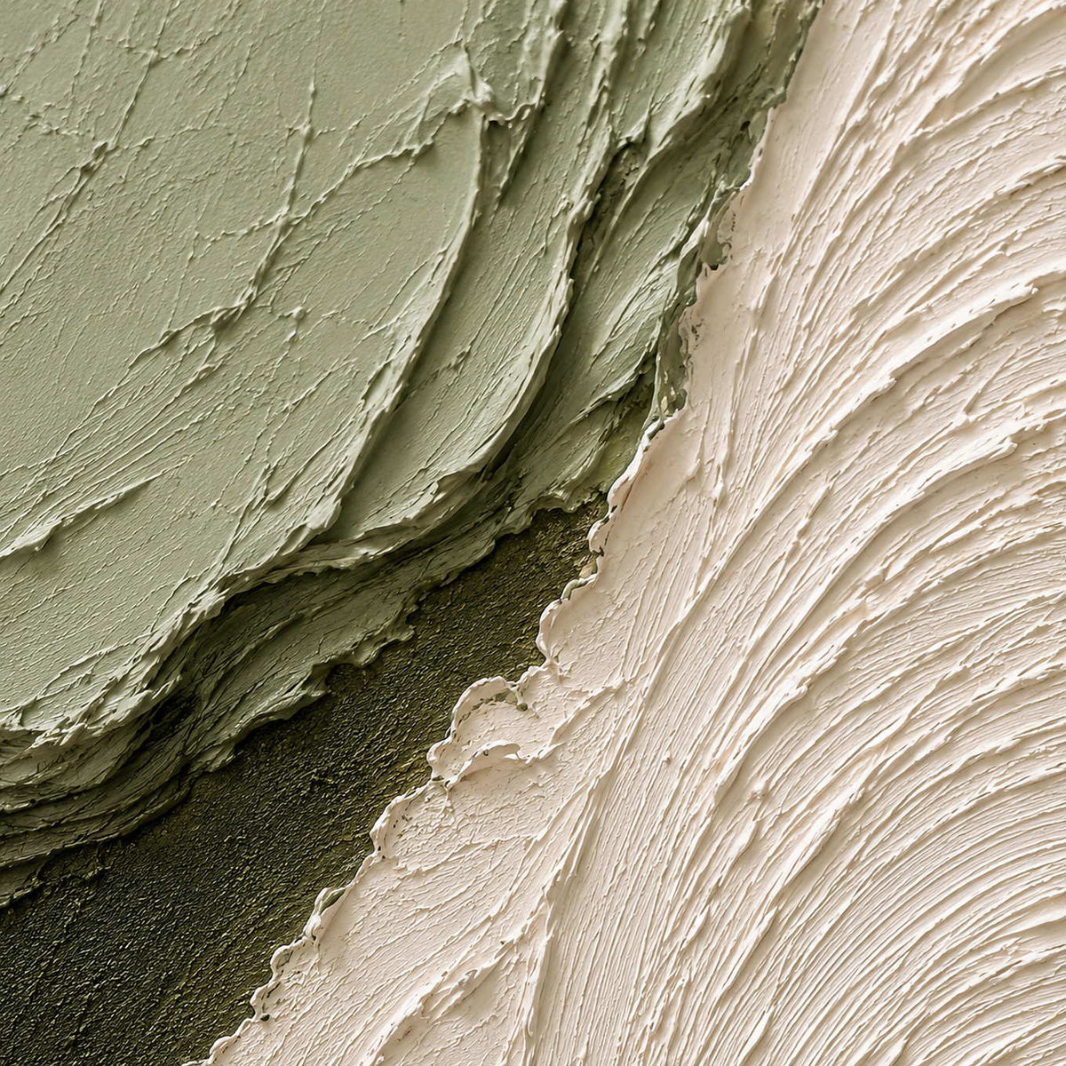 Close-up of raised olive and ivory relief texture.