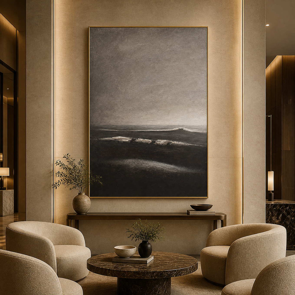 Moody gray coastal artwork displayed in a luxury hotel lobby.