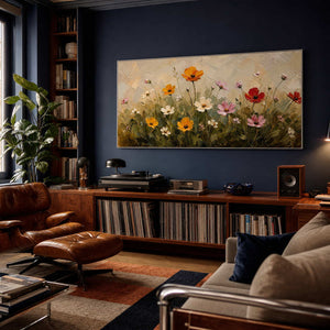 Textured wildflower artwork set against a deep blue home office wall.
