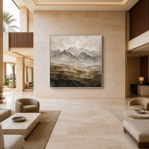 Square mountain wall art displayed in a sandstone resort hotel lobby.