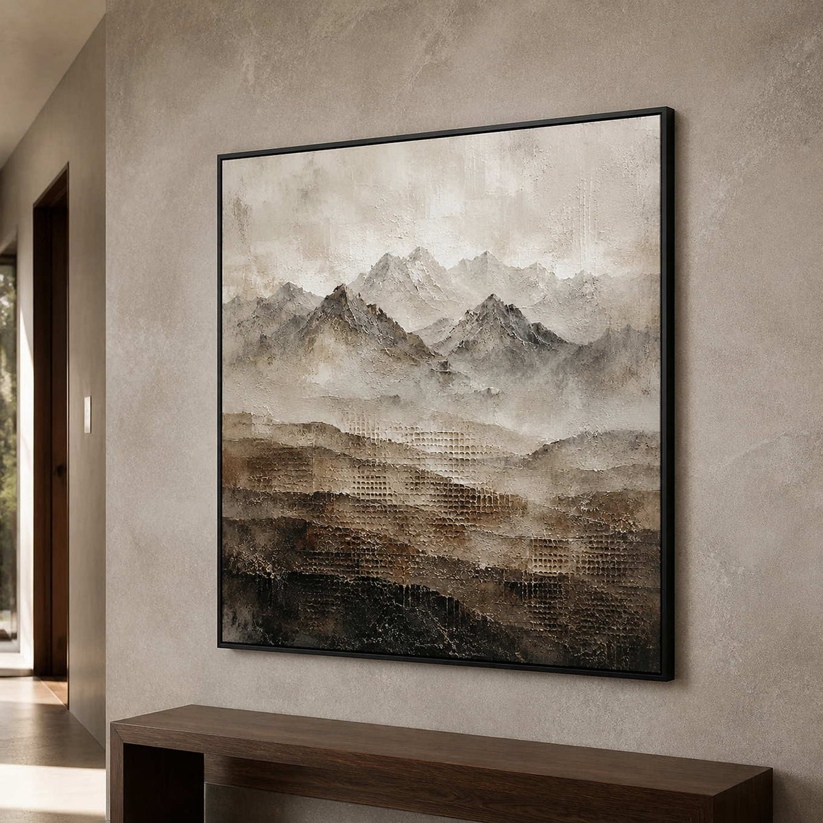 Square mountain landscape wall art shown from the side in a gray-brown stone corridor.