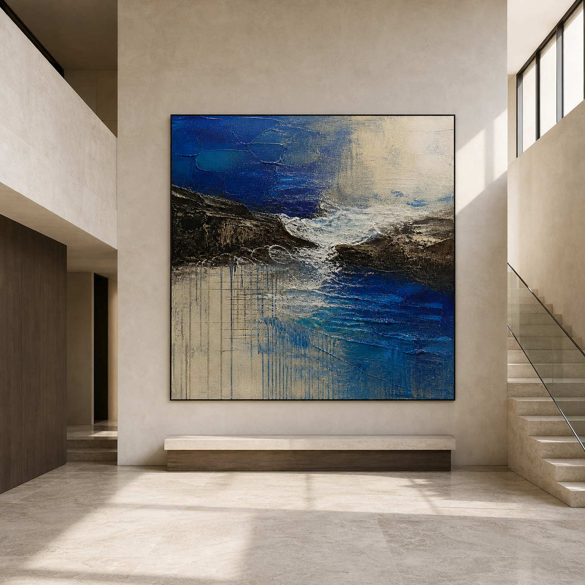 Large blue ocean abstract artwork in a double-height modern foyer.