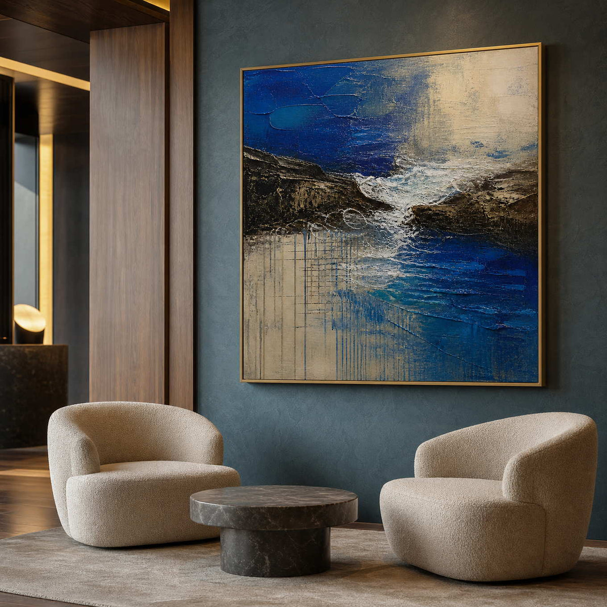 Cobalt blue coastal wall art in a refined boutique hotel lounge.