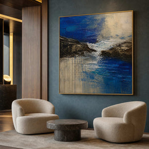 Cobalt blue coastal wall art in a refined boutique hotel lounge.