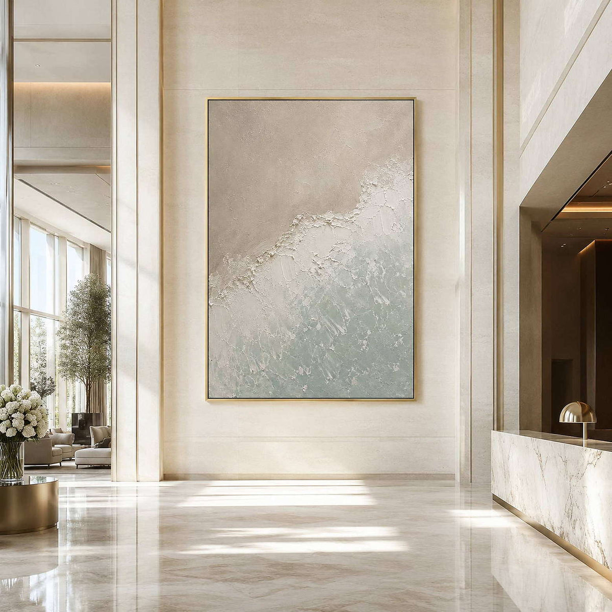Textured coastal wall art displayed in a quiet hotel lobby.