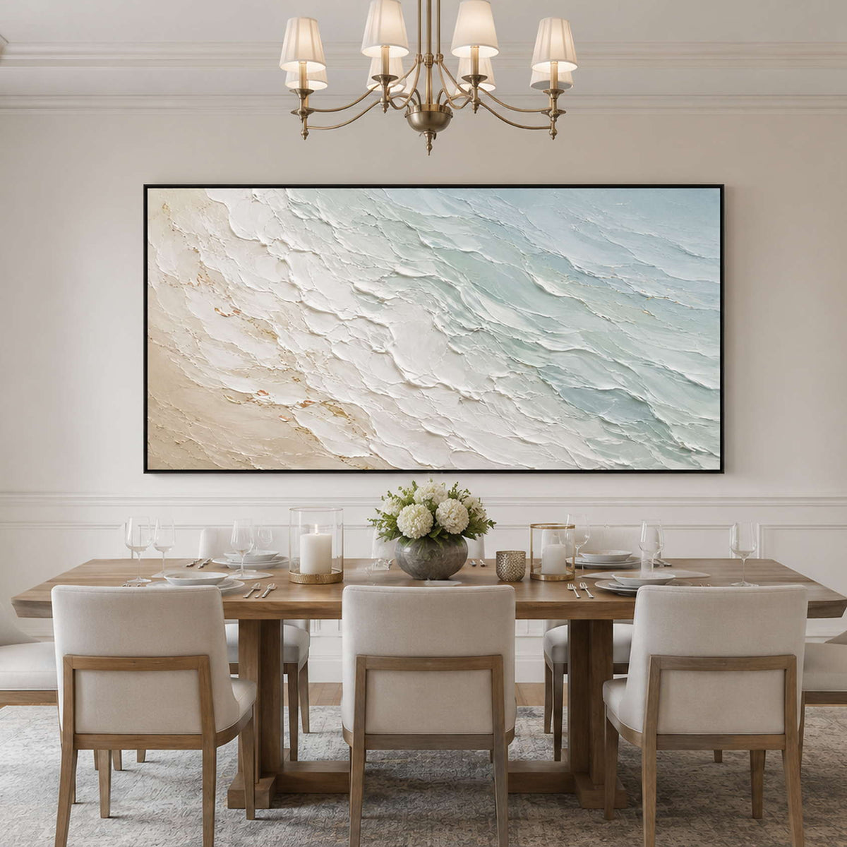 Large panoramic coastal wall art displayed in a refined dining room.