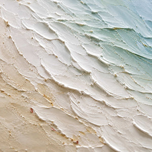 Close-up of raised ivory, sand, and sea-glass palette-knife texture.