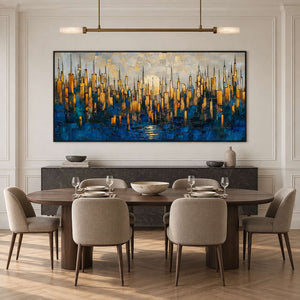 Wide cityscape artwork above a dark sideboard behind a set wood dining table.