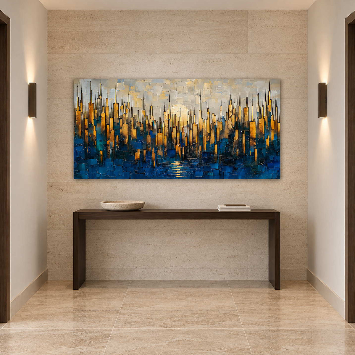Gold and blue city artwork above a slim dark console between paired wall sconces.