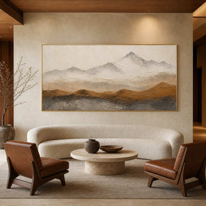 Large mountain wall art in a modern alpine hotel lobby.