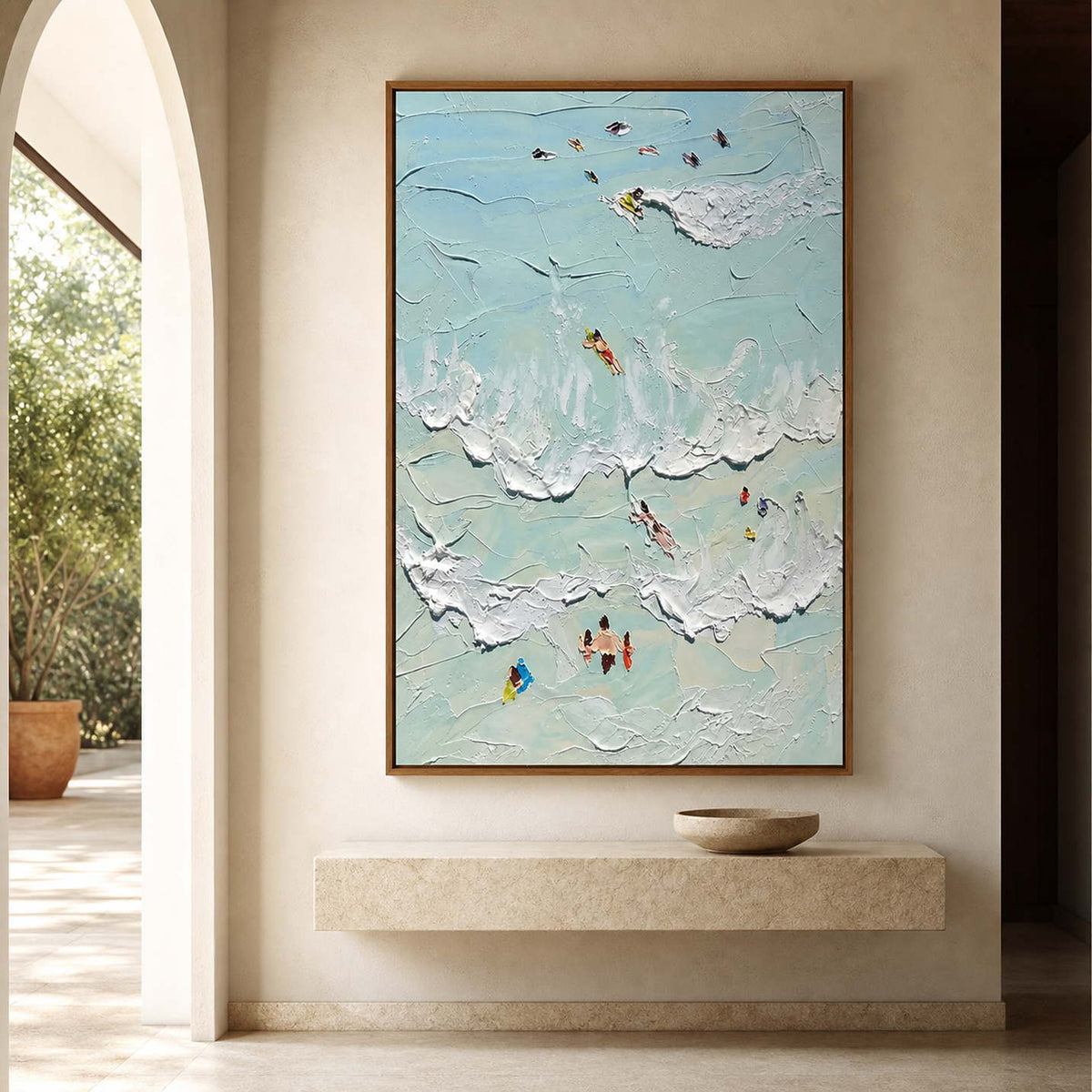 Sea-glass swimmer painting above a warm minimalist entryway console.