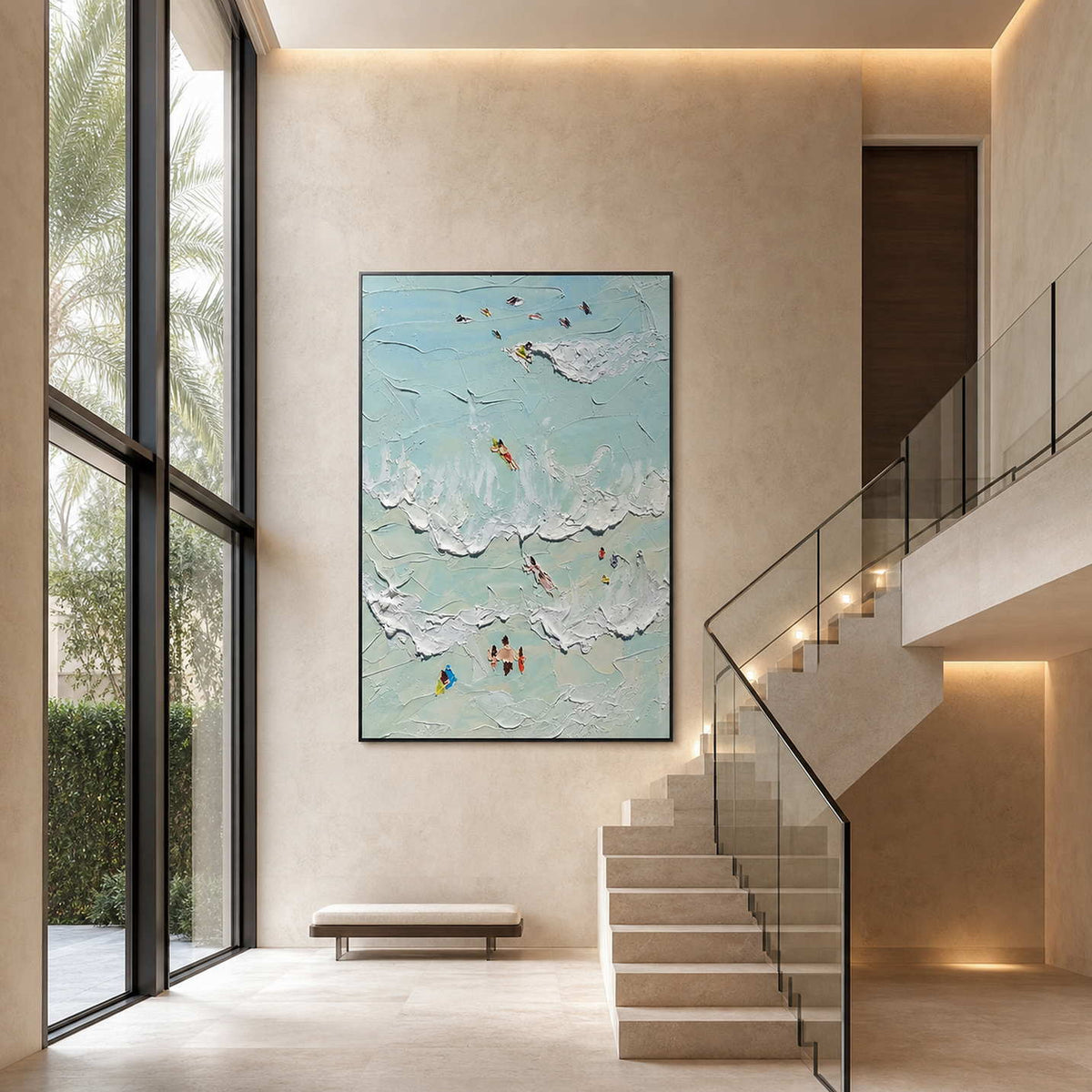 Textured coastal artwork displayed in a bright double-height stair hall.