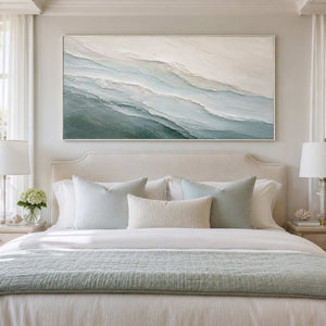 Calm coastal wall art for a serene bedroom.