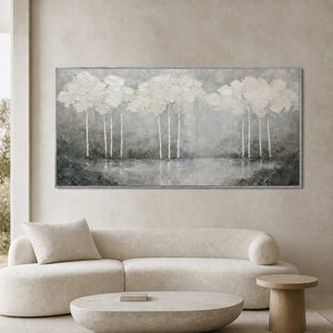 Textured landscape wall art displayed in a refined minimalist living room.