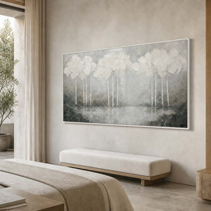 Textured landscape wall art displayed in a refined retreat hotel suite.
