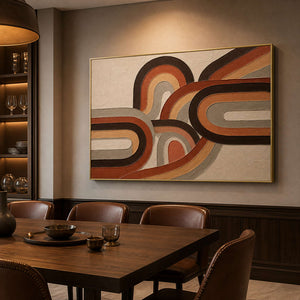 Terracotta and brown boho wall art displayed in a refined dining room.