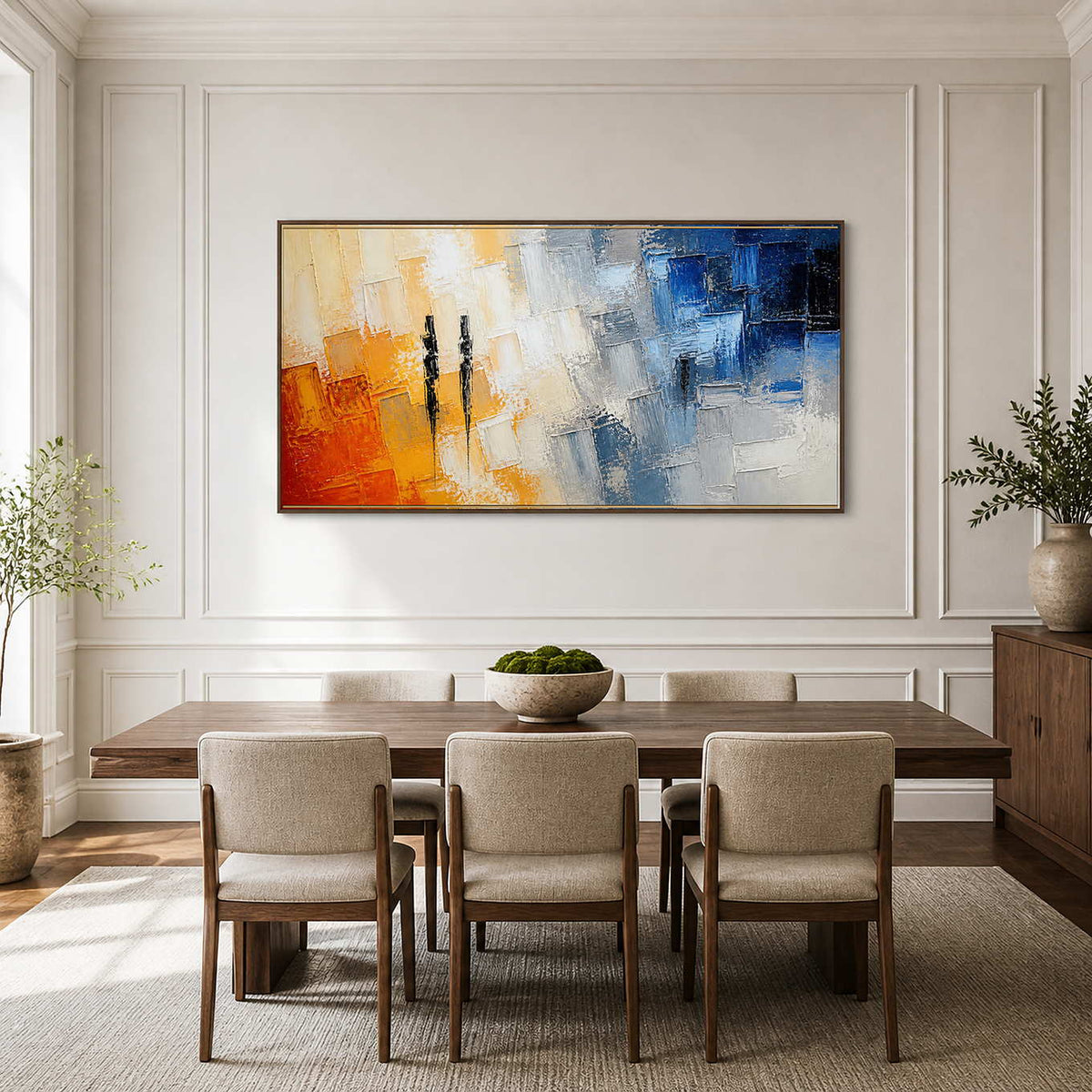 Panoramic textured abstract art brings warm and cool balance to an elegant dining room.