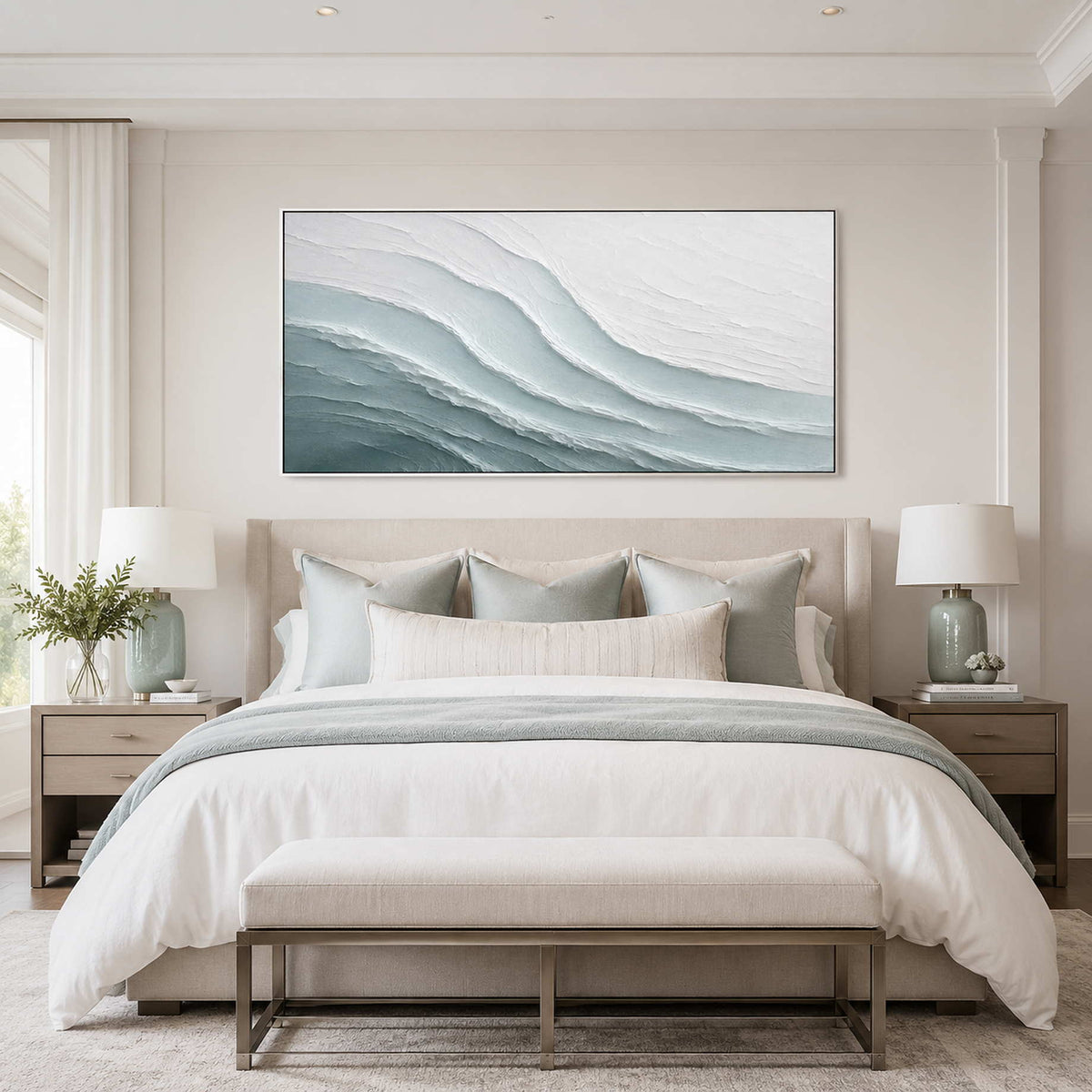 Panoramic coastal wall art above a calm neutral bedroom
