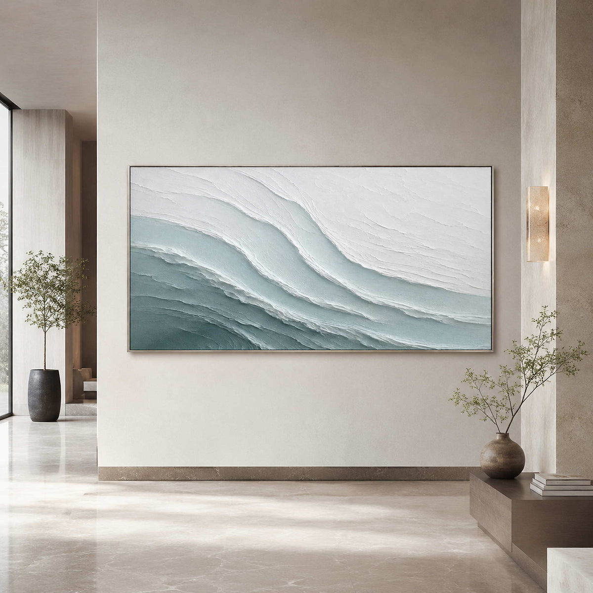 Layered ocean artwork in a serene modern hotel lobby