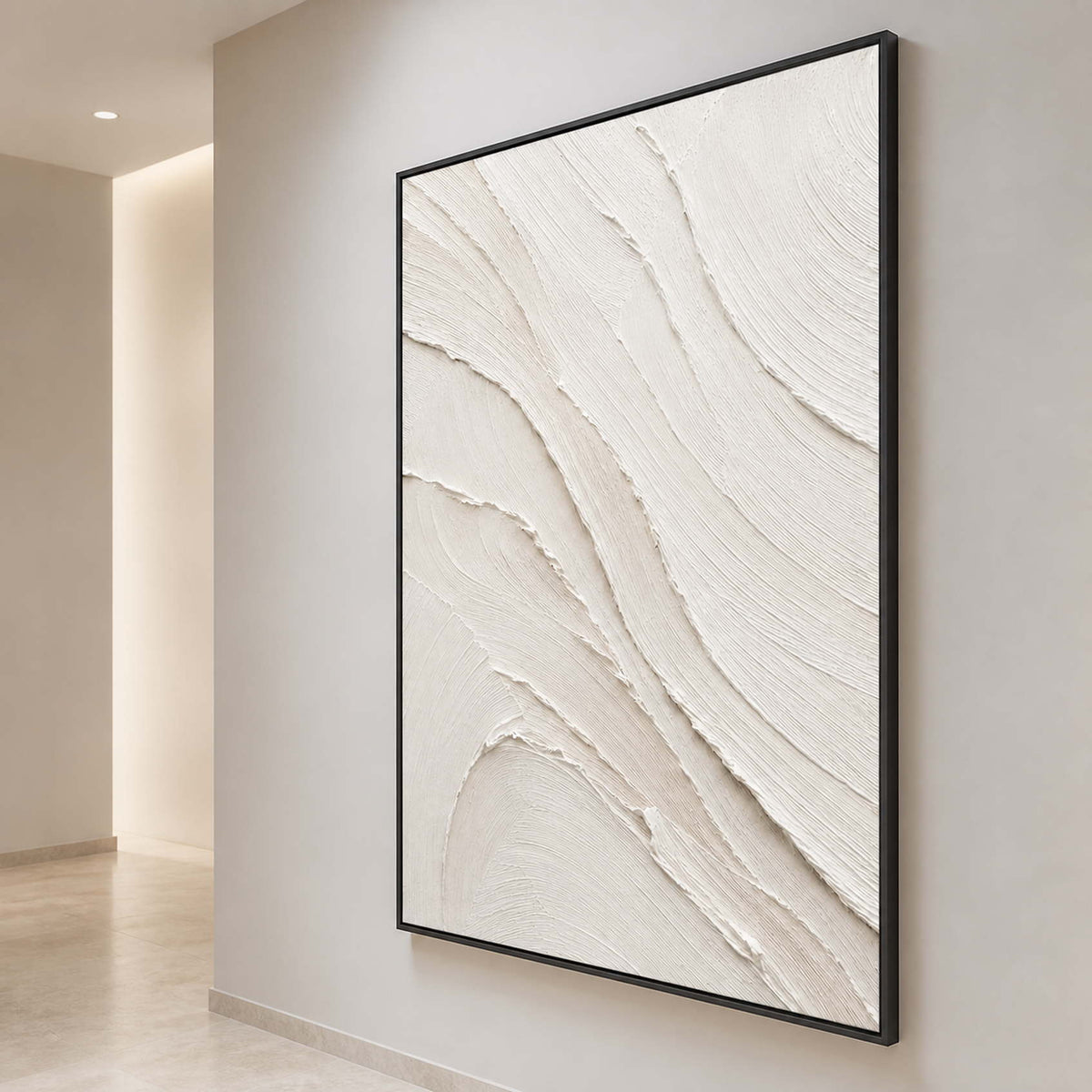 Textured ivory wall art shown from the side in a cream art corridor.
