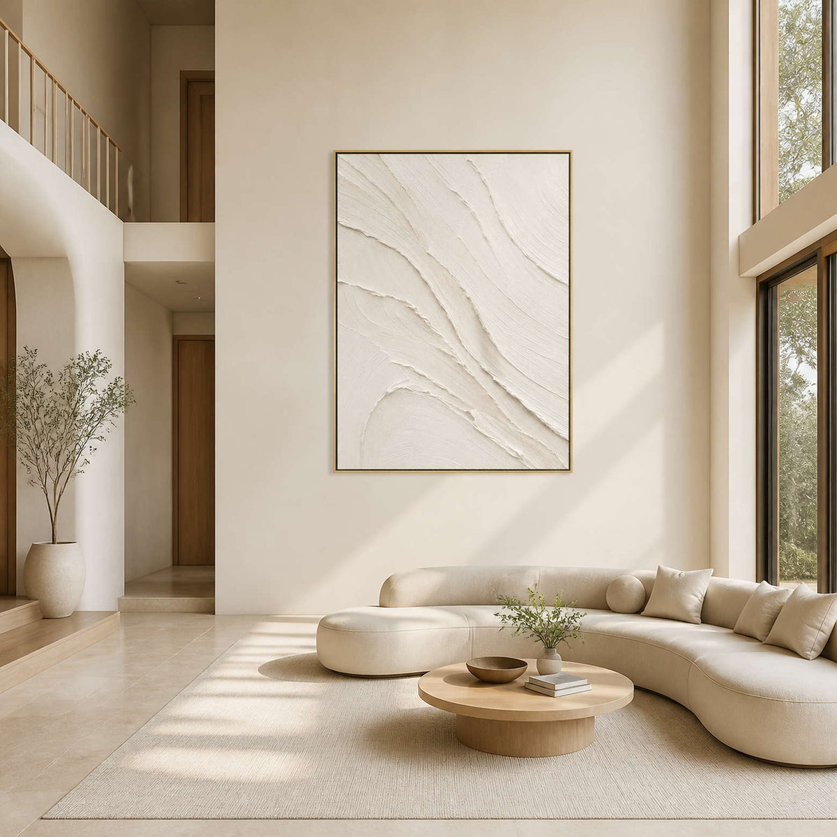 Textured ivory minimalist wall art displayed in a warm white double-height living room.